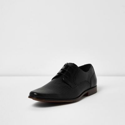 Black embossed leather formal shoes